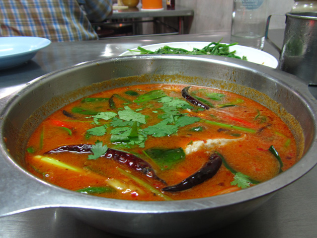 Spicy Thai soup with fish (tom yum pla ต้มยำปลา)