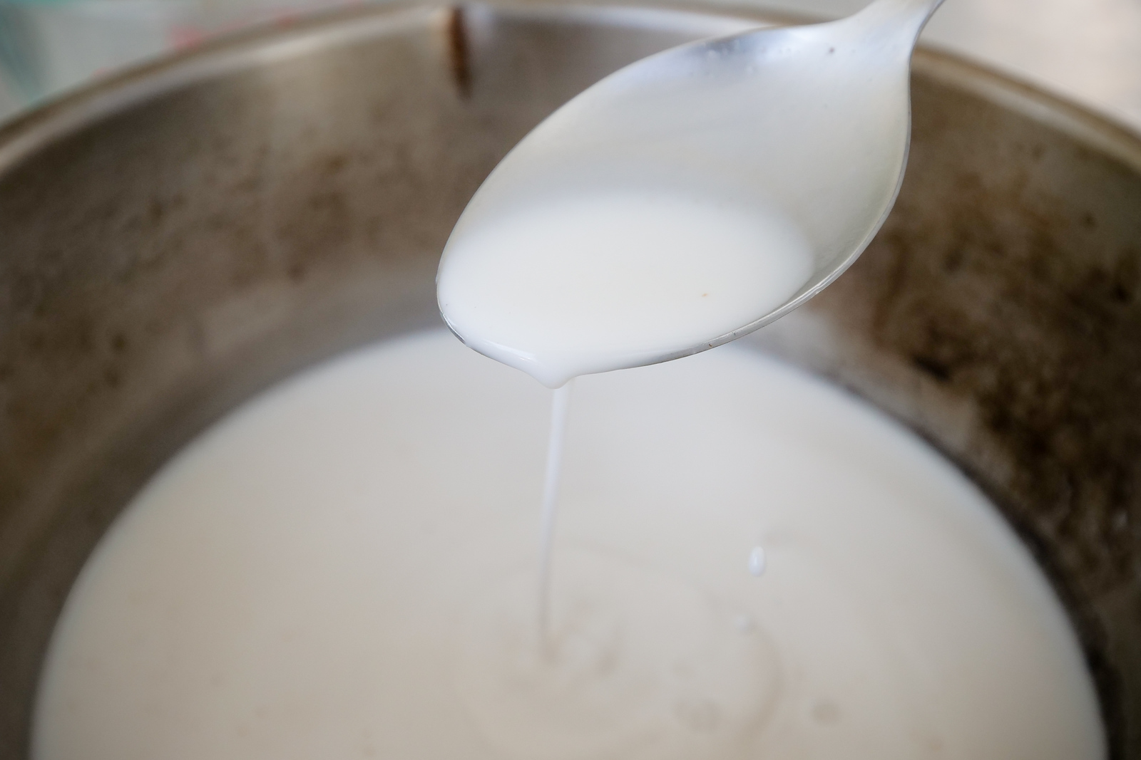 Use a spoon to gently ladle on your pure coconut cream