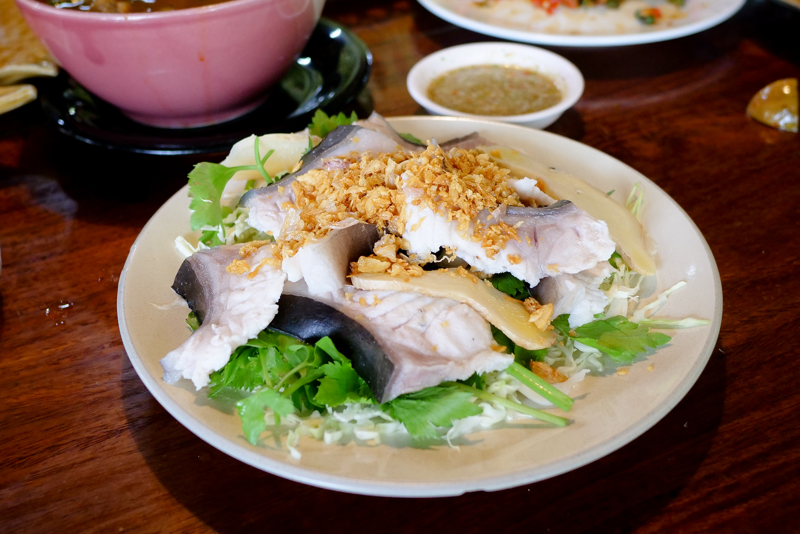 Huge chunks of catfish that have been steamed with precision