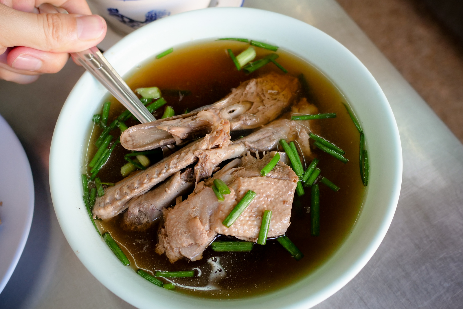Wonderfully tender duck meat in a lime pickle soup