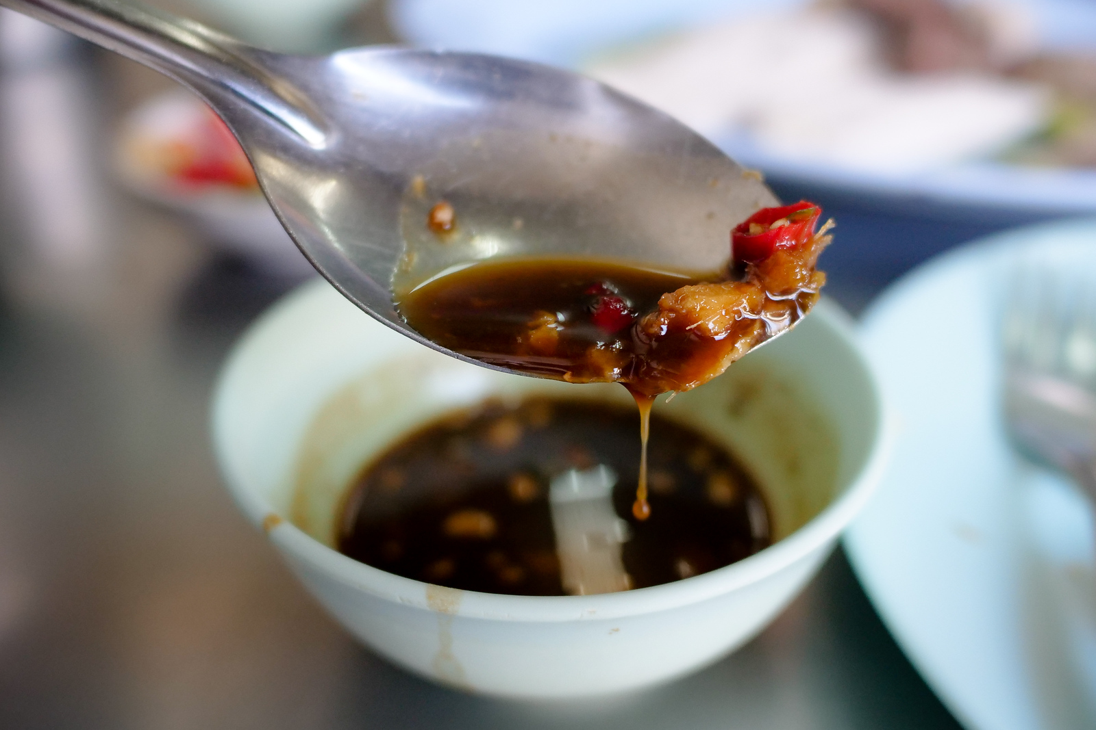 Dipping Sauce of chili, ginger, and soy sauce