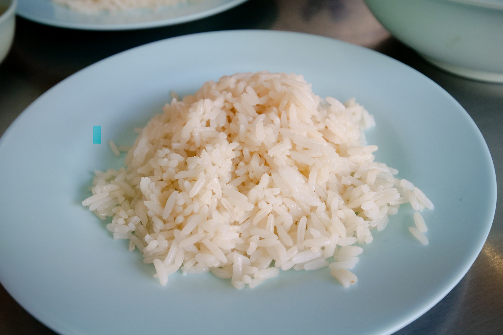 Gentle rice texture is important to Hainan style chicken rice